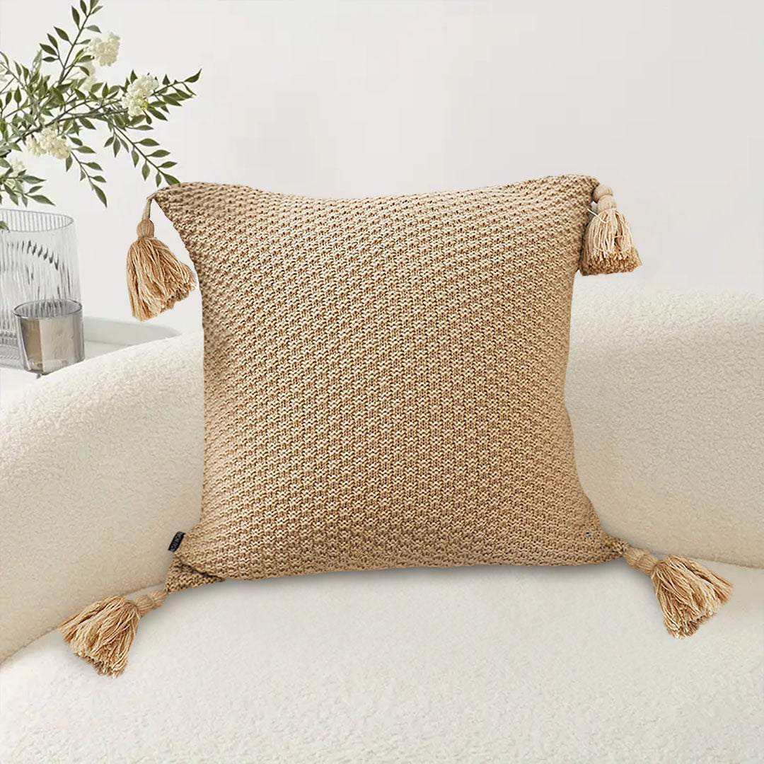 light brown tassled square cushion