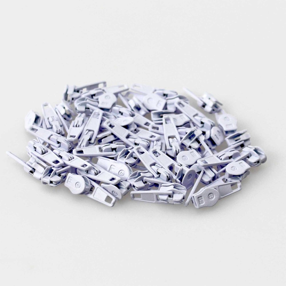 white zipper sliders for crafts and sewing